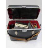 Assorted camera accessories in hard case. Price guide £10-15.