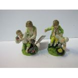 Rare pair of 18th century Staffordshire figures: 2 boys fighting over fruit (tip of thumb missing on