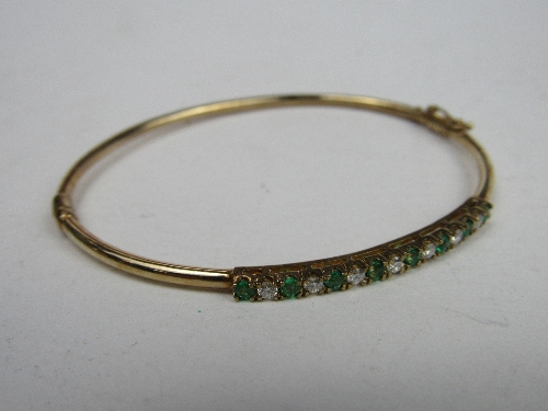 9ct gold bangle with green & diamond stones, weight 5.7gms & a pair of clip-on diamond drop