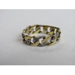 Yellow & white chain link band, the white links set with 4 diamond chips, wt 6.5gms. Price guide £