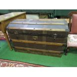 Domed top travelling trunk, 92cms x 49cms x 59cms. Price guide £20-30.