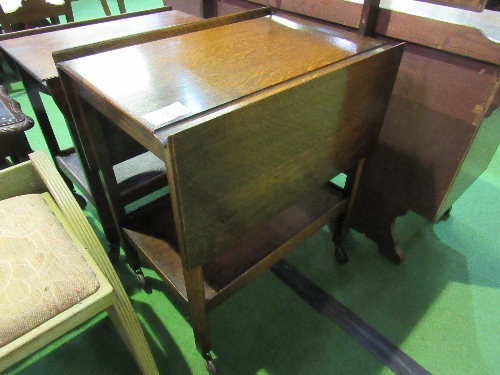 2 vintage oak drop-side tea trolleys. Price guide £10-20.