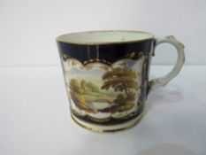 English circa 1820 china mug decorated with castle scenes. Price guide £80-100.