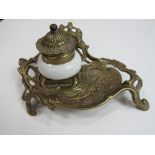 Art Nouveau gilt brass inkstand with hinge lid & ceramic inkwell. Price guide £50-80.