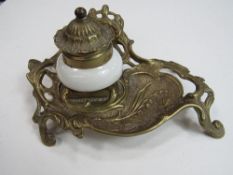 Art Nouveau gilt brass inkstand with hinge lid & ceramic inkwell. Price guide £50-80.