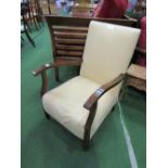 Yellow coloured upholstered easy chair. Price guide £10-20.