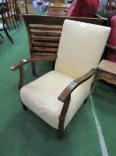 Yellow coloured upholstered easy chair. Price guide £10-20.