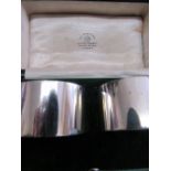 A pair of silver napkin rings by Mappin & Webb, London 1918, in original box, weight 3ozt. Price