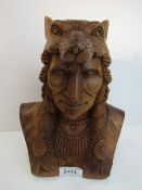 Large hand-carved red oak Indian chieftain bust wearing wolf headpiece. Price guide £50-80.