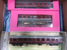 5 Mark I LMS coaches. Price guide £20-30.