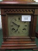 Early 20th century German 'Architectural' style chiming clock. Price guide £10-30.