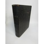 The Holy Bible, published in 1872, folio size, in full leather binding, edges of text gilded & in