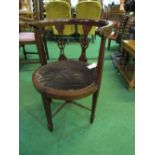 Edwardian inlaid library tub chair with pierced splats & curved top rail. Price guide £20-30.