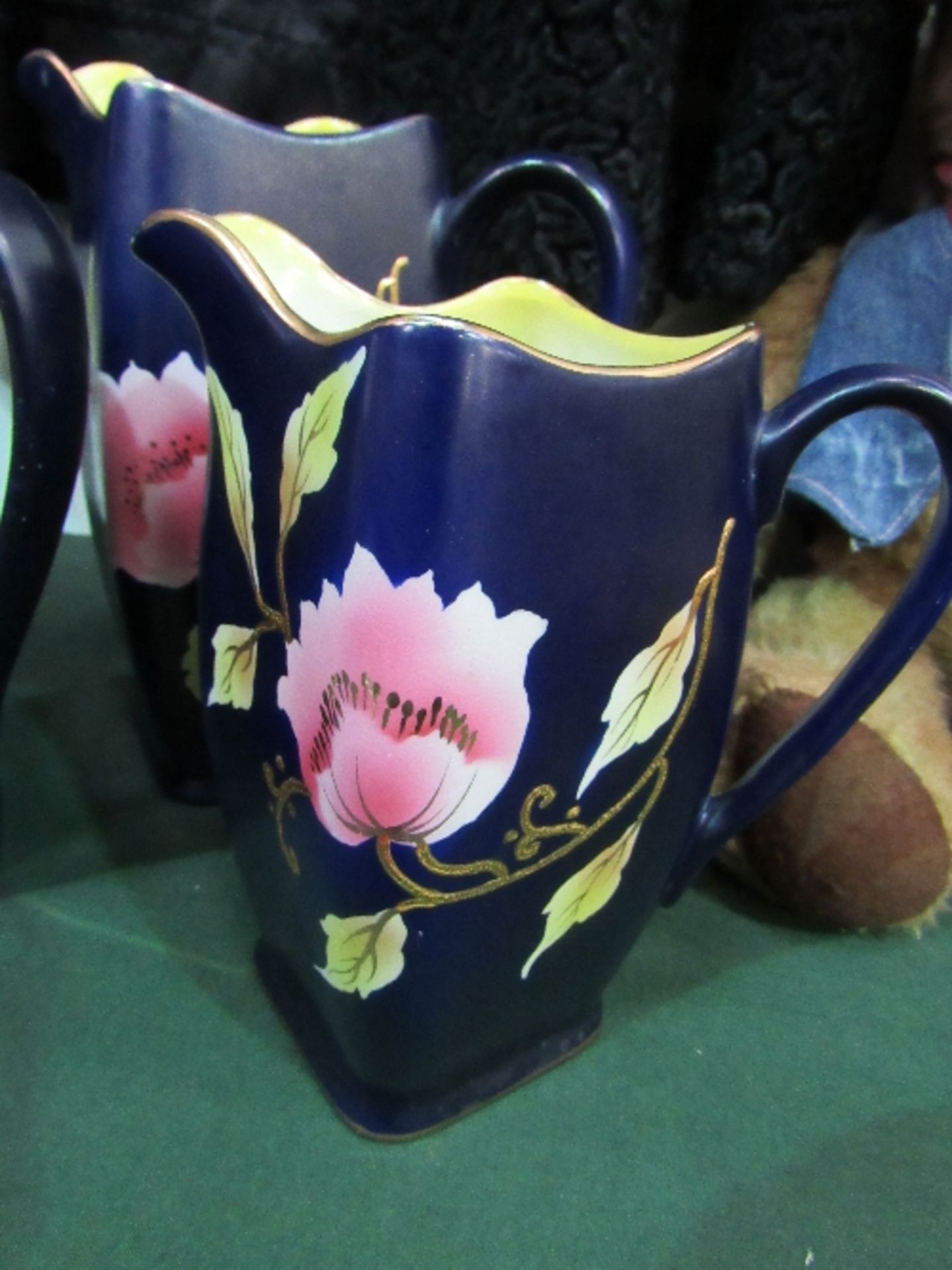 3 graduated jugs, blue with gold rims & flower pattern, 1920's/1930's. Price guide £15-20. - Image 2 of 2