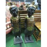 A pair of carved wood ethnic figures. Price guide £20-30.