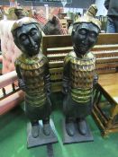 A pair of carved wood ethnic figures. Price guide £20-30.