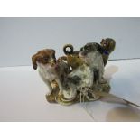 Very rare Mieissen figurine of 3 dogs, circa 1820. Price guide £1,200-1,400.