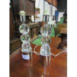 Pair of glass & chrome table lamps. Price guide £10-20.