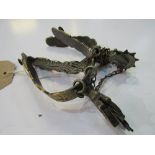 2 decorative rowel spurs. Estimate £5-10.