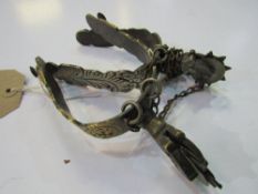 2 decorative rowel spurs. Estimate £5-10.