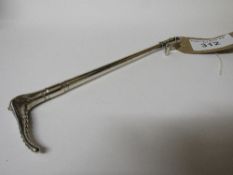 Solid silver model hunting crop, London 1921 by B&S, length 25cms, weight 8.1ozs. Estimate £80-100.