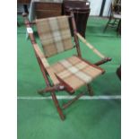 Bamboo-effect tartan fabric folding chair. Estimate £40-60.