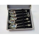 A set of 6 oriental silver spoons in case. Estimate £15-20.