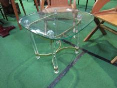 Glass, brass & lucite low table, 61cms x 67cms x 55cms. Estimate £20-30.