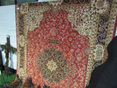 Red ground Keshan carpet, 2.8 x 2.0. Estimate £70-80.