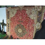 Red ground Keshan carpet, 2.8 x 2.0. Estimate £70-80.
