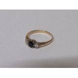 9ct gold ring set with black stone & diamonds to either size, 2gms, size M. Estimate £30-40.