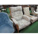 Ercol armchair c/w detachable cushions. Estimate £70-100.