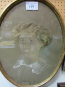 Edwardian large oval pastel portrait of a young woman in gilt/gesso frame with indistinct