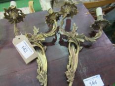 4x 2 branch gilded decorative metal wall lamps. Estimate £20-40.