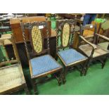 2 oak framed cane back & drop-in seat dining chairs. Estimate £10-15.