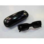 Gucci rectangular sunglasses in case, Code GG2409/N/S. Made in Italy. Estimate £30-50.