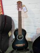 Aria AMB-JR semi-acoustic guitar in good condition (stand not included). Estimate £50-60.