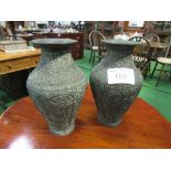 A pair of bronzed metal vases. Estimate £10-20.