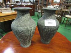 A pair of bronzed metal vases. Estimate £10-20.