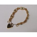 18ct gold bracelet set with green stones & diamonds, weight 26.5gms. Estimate £480-520.