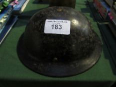 1940's British Civil-issue Bakerlite Brodie helmet, marked Plasfort. Estimate £20-30.