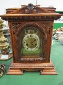 Large mahogany cased mantel clock. Estimate £20-30.