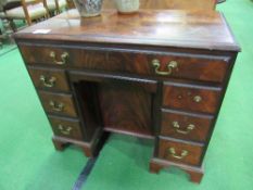 Small mahogany knee-hole desk, 85cms x 46cms x 74cms. Estimate £30-50.