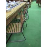 8 metal framed & wooden slatted chairs. Estimate £80-100.