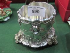 Unusual Victorian heavily embossed silver plated bottle stand decorated with grapes, vines & nude