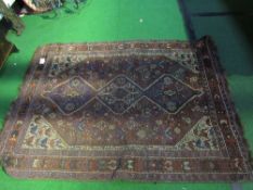 Persian red ground Eastern rug, 170cms x 130cms. Estimate £20-30.