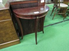 Small mahogany demi-lune table on 3 sabre legs. Estimate £5-10.