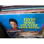Collection of Elvis Presley records. Estimate £15-20.
