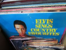 Collection of Elvis Presley records. Estimate £15-20.
