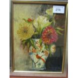 Framed oil on card of still life flowers & vase, signed. Estimate £5-10.